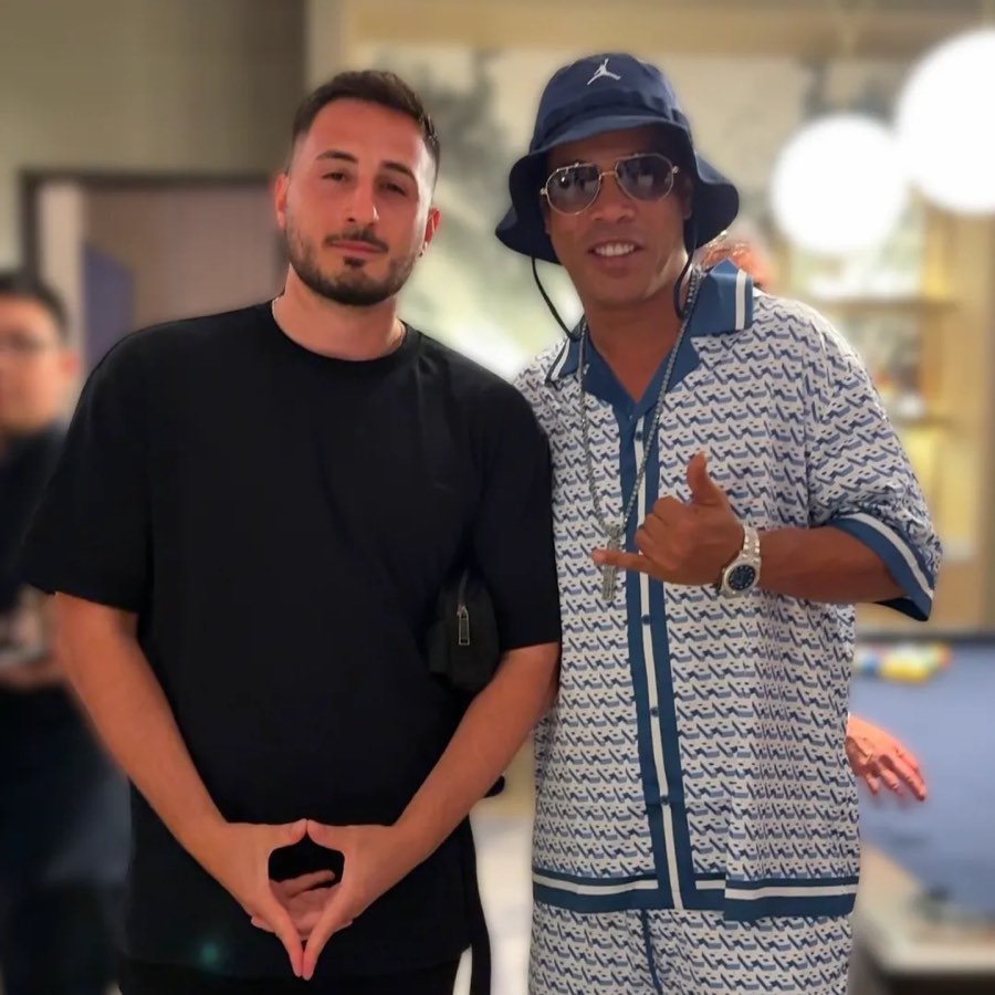 Nicholas Remondos with Ronaldinho